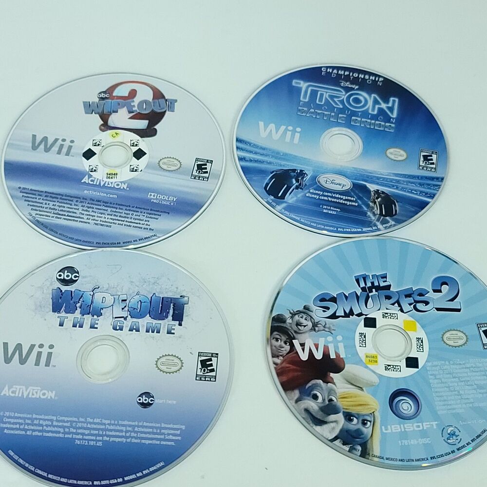 Nintendo Wii Games Lot of 4 Bundle Smurfs 2 Tron Wipeout 2 Wipeout the game